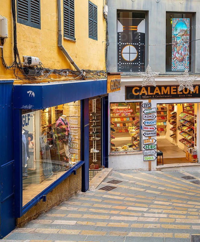 Decorative façade of small retailers in the old town of Palma de Majorca, Spain