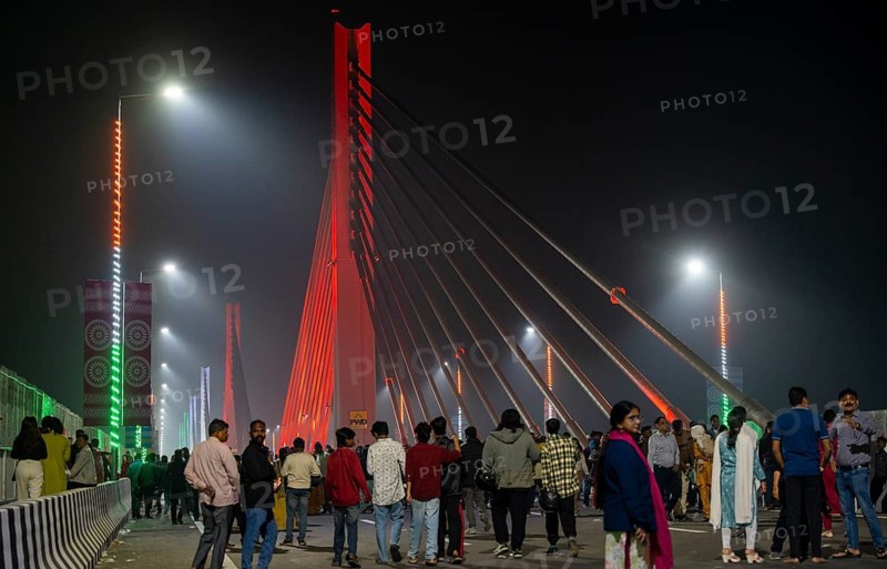 People gather on the newly inaugurated Kumar Bhaskar Varma Setu, a six-lane cable styled bridge over the Brahmaputra River, in Guwahati, India on 15 February 2026