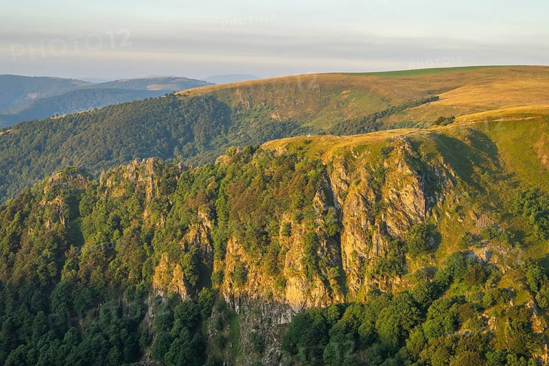 The first rays of sunshine at Mount Hohneck in the Vosges Mountains, France