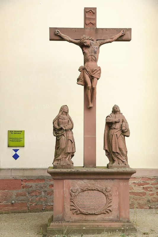 Crucifixion group in front of St. Dionysius church, monument protection sign, symbol, Sindlingen, Frankfurt am Main, Hesse, Germany