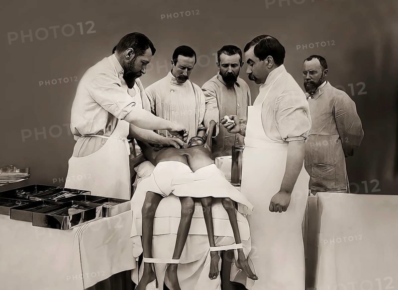 Dr Eugène-Louis Doyen, a French surgeon, separating the twins Radhika and Dudhika Nayak, 1902, digitally edited according to a photograph