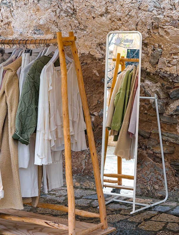 Fashionable women's wardrobe on a clothes rack in front of the entrance to a boutique, Soller, Majorca, Balearic Islands, Spain