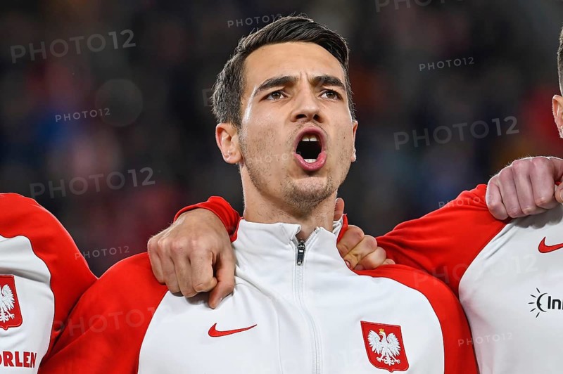 PRAGUE, CZECH REPUBLIC - MARCH 24, 2023: Qualifications for UEFA Euro 2024. Match Czech Republic - Poland 3:1. Jakub Kiwior during anthem.