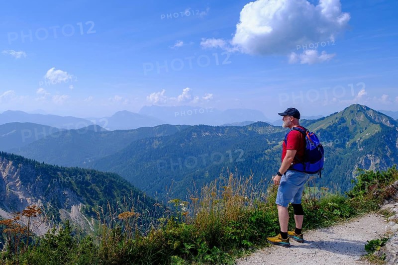 Hikers, mountaineers on Hochfelln, summit, near Bergen, Chiemgau, Upper Bavaria, Bavaria, Germany