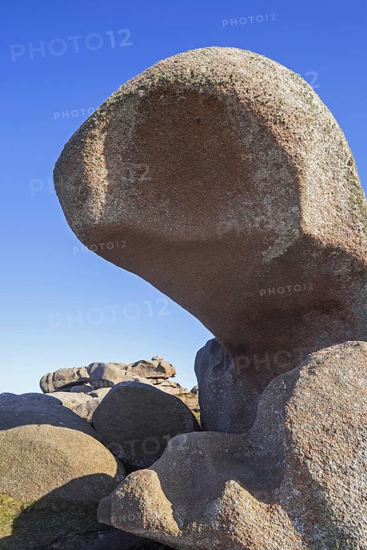 Strange rock formations and water, wind eroded boulders along the Côte de granit rose, Pink Granite Coast, Côtes d'Armor, Brittany, France