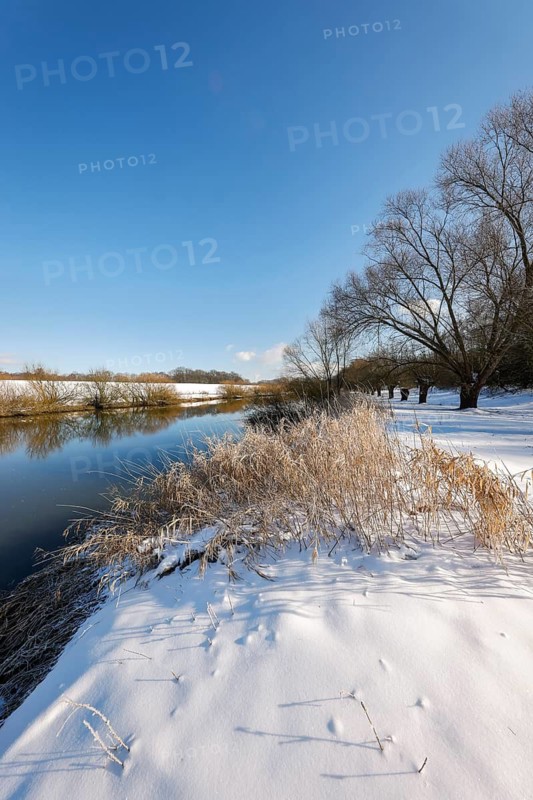 Dorsten, North Rhine-Westphalia, Germany - Sunny winter landscape in the Ruhr area, ice and snow on the river Lippe