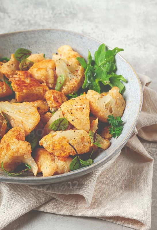 Fried cauliflower salad, with spices and herbs, homemade, no people