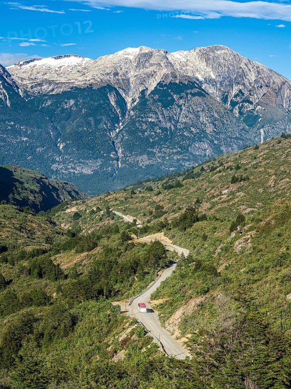 Road Carretera Austral south of Cochrane, mountain pass, driving bus, Patagonia, Chile