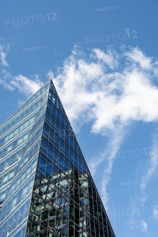 A Modern futuristic designed commercial office high rise building in the city of London, capital of the United Kingdom