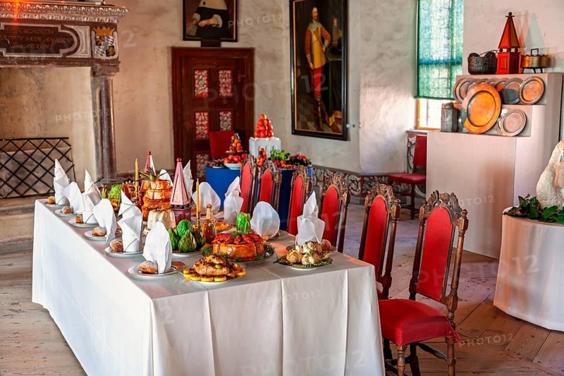 Banquet hall with a in an old castle with a festive dinner in a historic setting, Läckö castle, Lidköping, Sweden