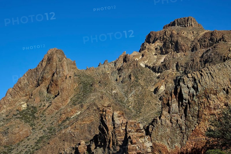 Steep mountain rocks under bright blue sky, Teide, Parque Nacional del Teide, Teide National Park, volcano, volcanism, UNESCO World Heritage Site, Tenerife, Canary Islands, Spain