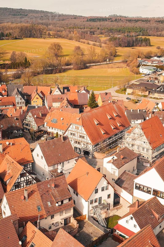 View of a charming city center with historic half-timbered houses and red roofs, Ötisheim, Enzkreis, Germany