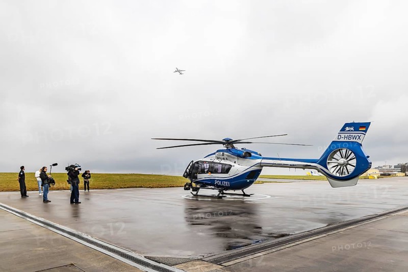 Helicopter from the Baden-Württemberg Police team in front of the hangar at the airport. Airbus Helicopters H145. Stuttgart, Baden-Württemberg, Germany