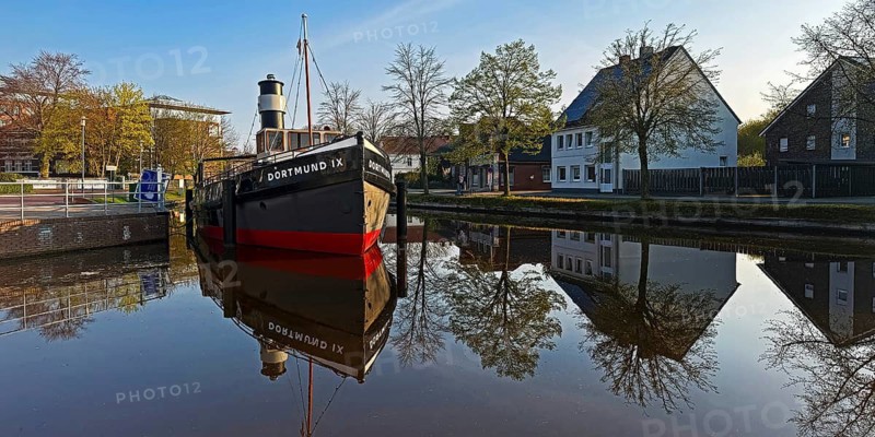 Open air shipping museum on the main canal with the museum ship Dortmund IX, Papenburg, Fehn-Kolonie, Emsland, Lower Saxony, Germany