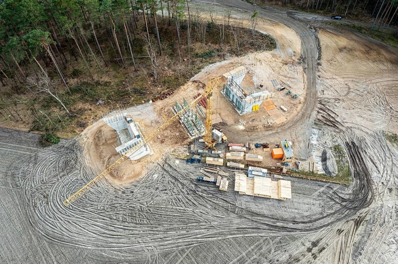Aerial view of construction site, new bridge is build as part of bypass road, Celle, Germany