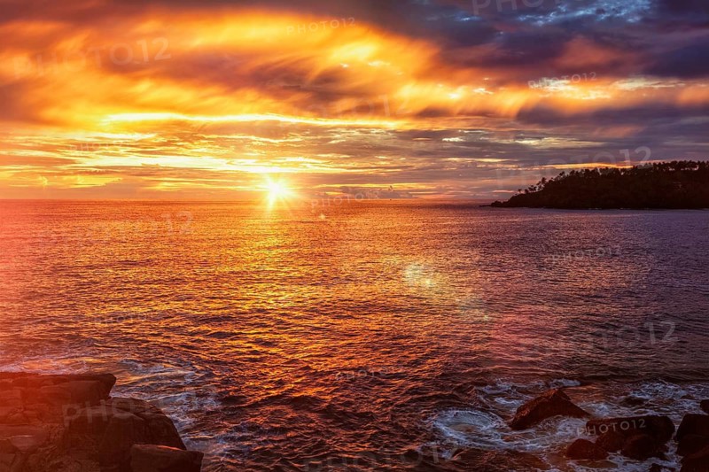 Beach resort vacation holidays background, tropical ocean sunset with dramatic sky. Mirissa, Sri Lanka