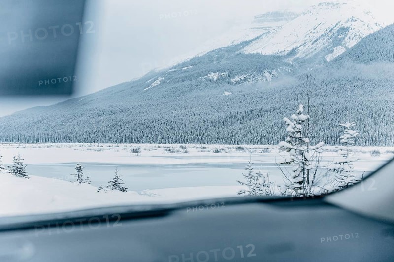Winter road trip on the Icefields Parkway with lots of snow and ice, Banff National Park, Jasper National Park, Alberta, Canada