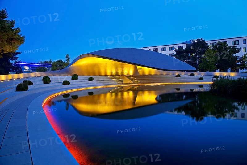 Illuminated Porsche Pavilion in the evening, Autostadt, Volkswagen AG, Wolfsburg, Lower Saxony, Germany