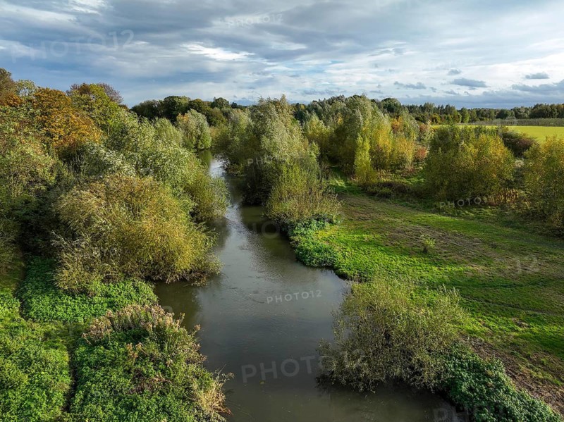 Bergkamen, Ruhr area, North Rhine-Westphalia, Germany, autumn landscape on the Seseke. The renaturalised Seseke, a tributary of the Lippe, has been transformed into a near-natural watercourse, flood protection and biodiversity through newly designed floodplains. Following the construction of a parallel sewer, the Seseke is now free of wastewater, having previously been an open, above-ground wastewater sewer, combined sewer with surface water and wastewater. Theme photo: EU Nature Conservation Act. The EU Nature Conservation Act obliges member states to implement measures to restore nature on at least 20 per cent of the EU's land and sea areas by 2030