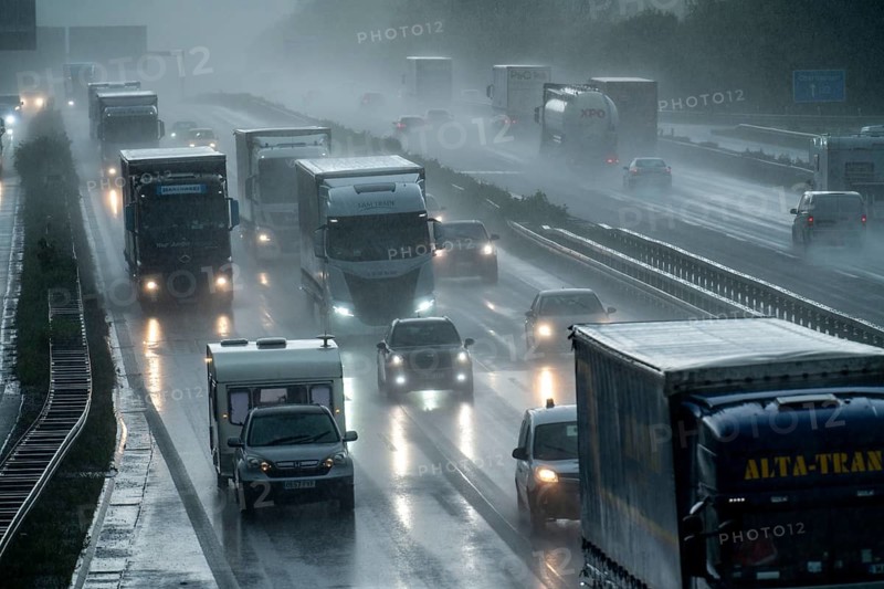 A2 motorway, at Recklinghausen motorway junction, heavy traffic during a thunderstorm, North Rhine-Westphalia, Germany