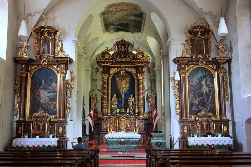 High altar from 1692 and side altars in the choir of the monastery church of Kreuzberg near the city of Bischofsheim an der Rhön, Rhön-Grabfeld district, Lower Franconia, Bavaria, Germany. The church of the monastery of Kreuzberg near the city of Bischofsheim, Rhön Mountains, Lower Frankonia, Bavaria, Germany