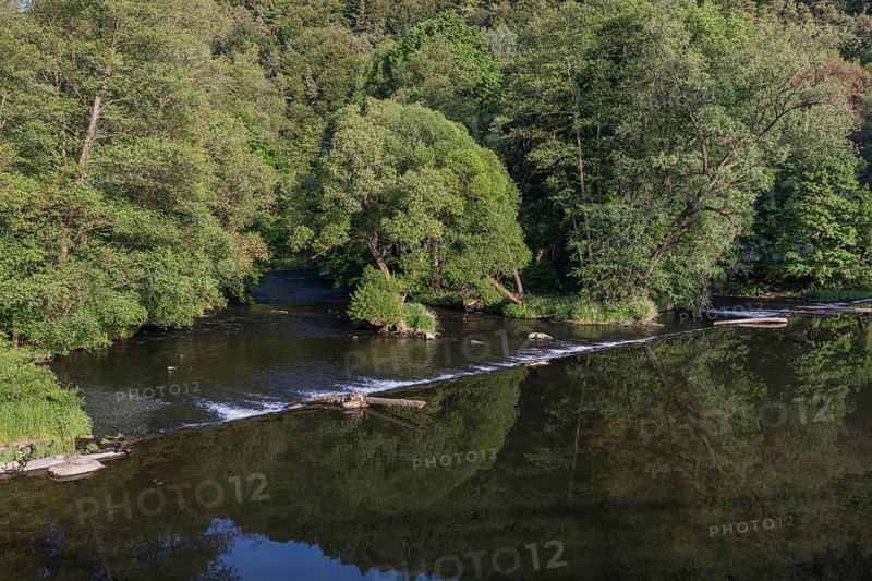 Thaya riverbanks. Hardegg is a small town in the district of Hollabrunn in Lower Austria, Austria. The Thaya valley is protected as a national park. On the Czech side is the Podyjí National Park