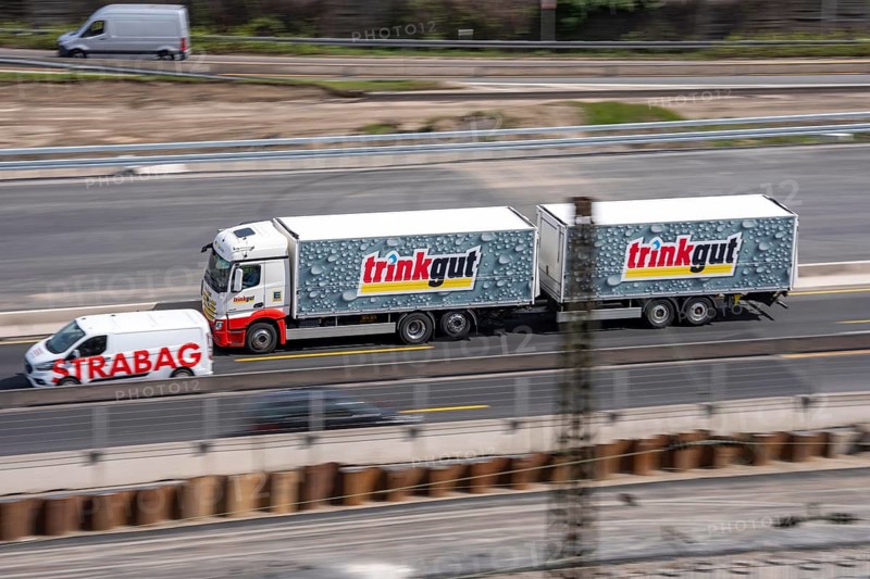 Freight truck for food logistics, on the highway, beverage market chain Trinkgut