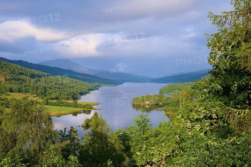 The river winds through a lush, wooded valley under a cloudy sky, Queens View, Fincastle, Pitlochry, Scotland, United Kingdom, Great Britain