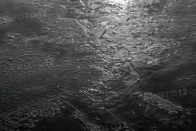 Frozen lake, structures of the water surface