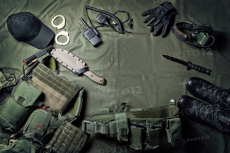 Military equipment or special agent gear concept flat lay background with copy space.