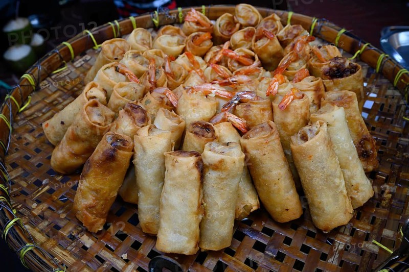 Tasty looking Chinese spring rolls for sale at a street market in Yaowarat Road, Chinatown, Bangkok, Thailand