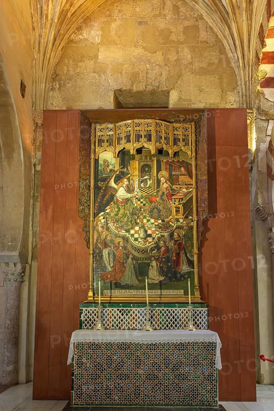 Magnificent altar with a religious medieval painting, framed by sacred architecture, Cathedral Mosque of Cordoba (Mezquita-Catedral), Cordoba, Andalusia, Spain