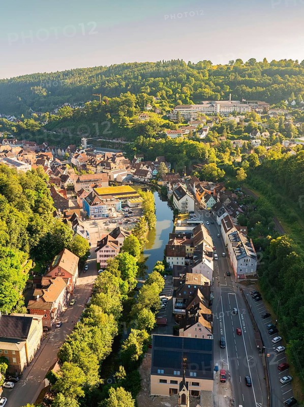Aerial view of a town along a river, embedded in a hilly, wooded landscape, Calw, Black Forest, Germany