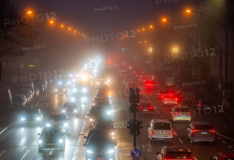 Dense fog, with visibility sometimes less than 100 metres, city centre traffic at rush hour on Alfredstraße, B224, in Essen, North Rhine-Westphalia, Germany