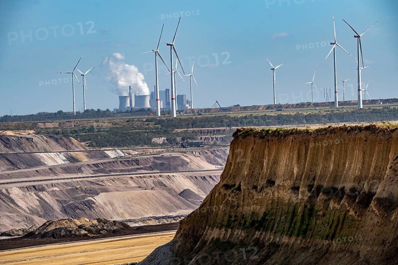 Edge of the Garzweiler II open-cast lignite mine, at the village of Lützerath, the last village to be excavated, in the background the Neurath lignite-fired power station, belongs to Erkelenz in the district of Heinsberg, North Rhine-Westphalia, Germany