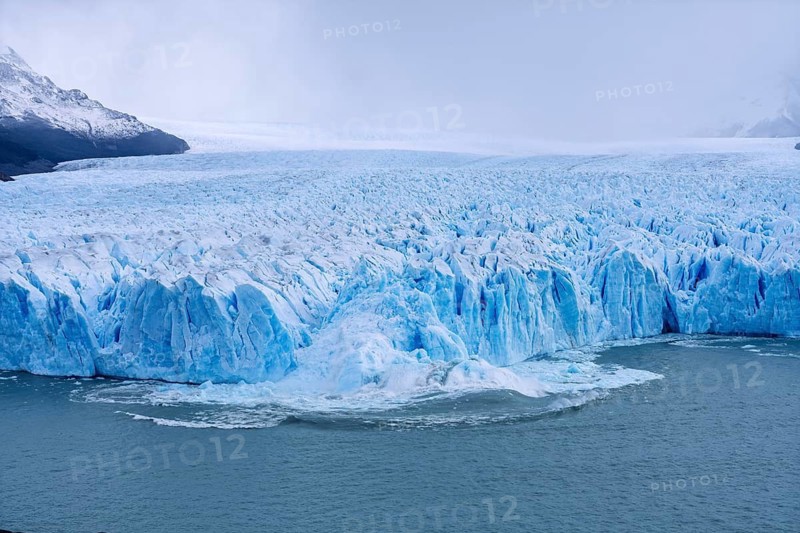 Perito Moreno glacier, breaking ice sheets plunge into Lake Argentino, blue glacial ice with crevices, Los Glaciares National Park, Patagonia, Argentina