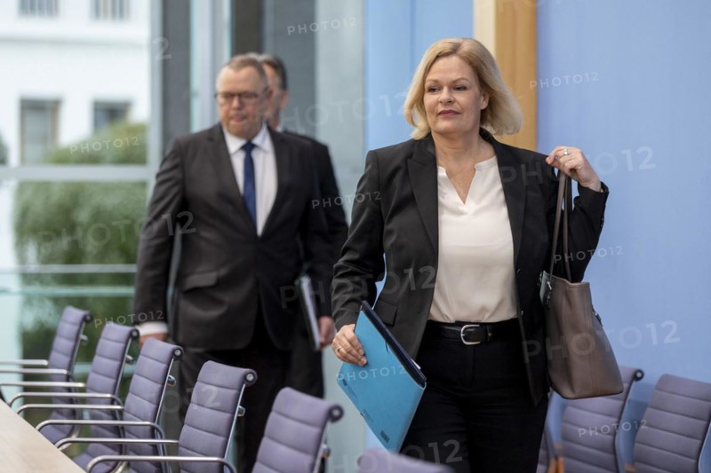 Nancy Faeser (SPD), Federal Minister of the Interior and Home Affairs, Michael Stuebgen, Chairman of the Conference of Interior Ministers and Holger Münch, President of the Federal Criminal Police Office, recorded at the Federal Press Conference on the presentation of the 2023 police crime statistics in Berlin, 9 April 2024