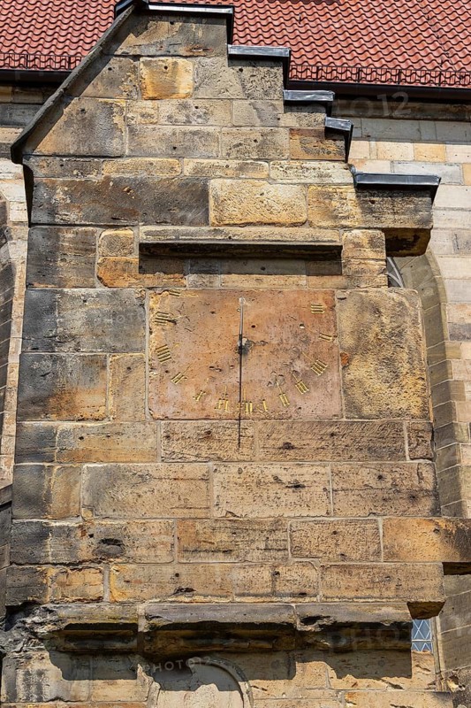 Detail of the outer wall, clock, St. Lamberti Church, Hildesheim, Lower Saxony, Germany