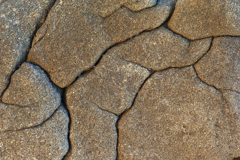 Stone with cracks, weathered rock by the sea, Quiberon, Brittany