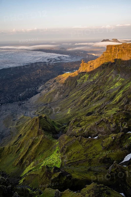 Cliff in the evening light, Impressive landscape with mountains and glaciers, Huldujökull and Kötlujökull glacier tongues, Myrdalsjökull glacier, Pakgil, Iceland