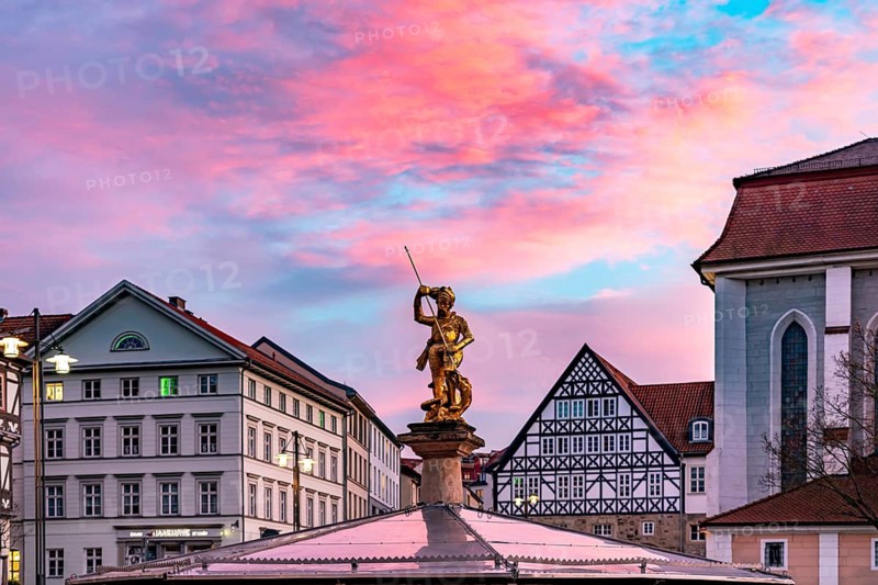 The golden town saint St George on the Georgsbrunnen fountain on the market square in Eisenach, Thuringia, Germany
