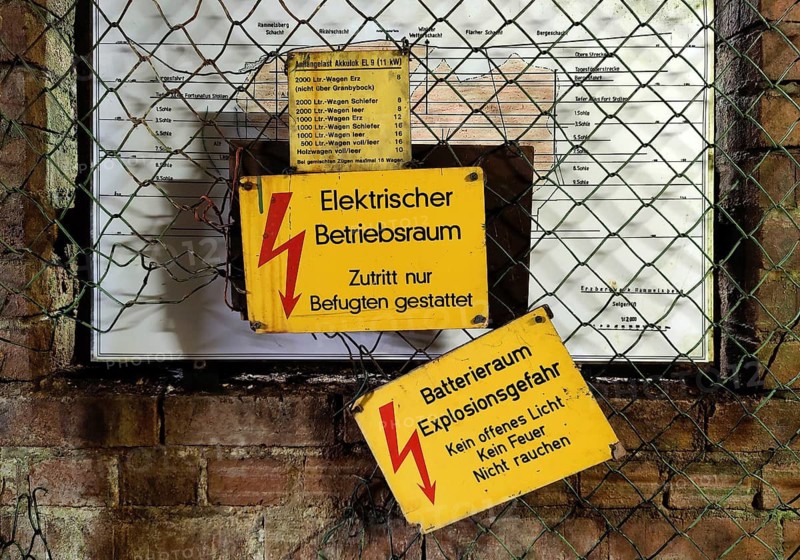 Warning signs, electrical operating room in the Rammelsberg ore mine, UNESCO World Heritage Site, Goslar, Lower Saxony, Germany