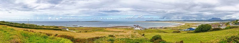 Extensive coastal landscape with sea, meadows and cloudy skies, Magheraroarty
