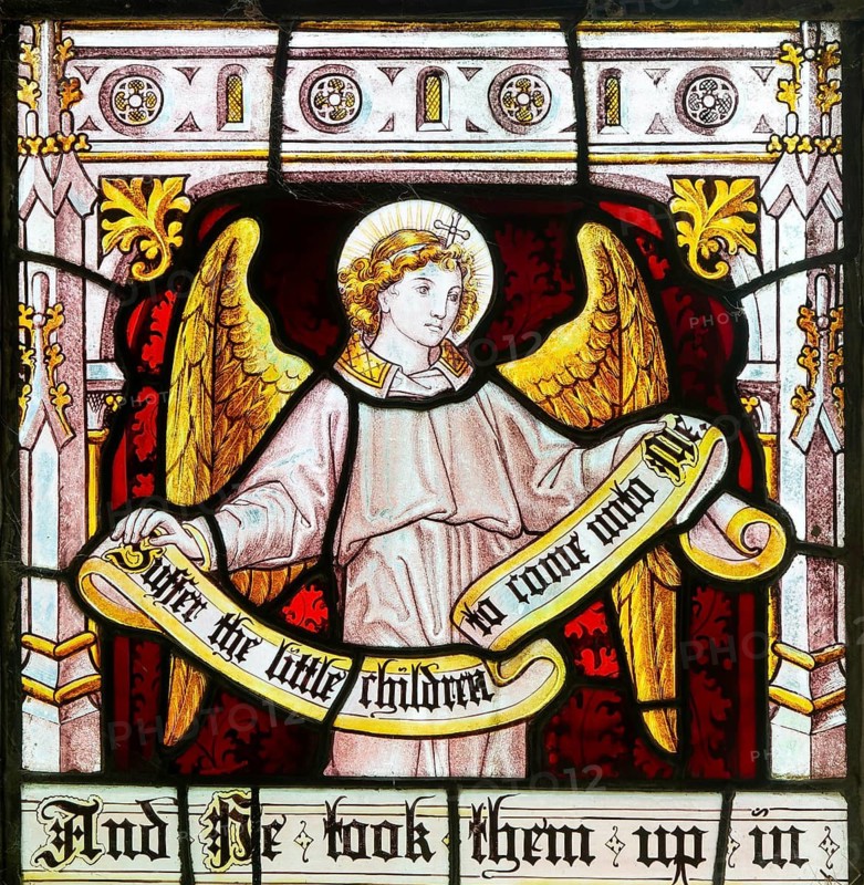 Detail of angel on stained glass window 'Suffer the Little Children' by Burlison & Grylls c 1880, Kelsale church, Suffolk, England, UK