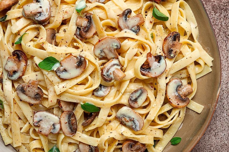 Fettuccine with champignons, basil, in cream sauce, homemade, no people
