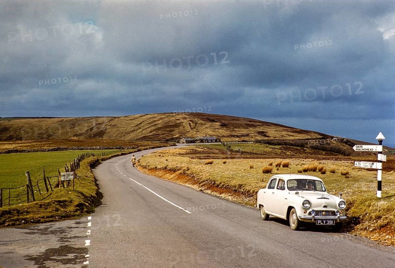 Austin Cambridge A50 car on the A39 near Oare, Exmoor National Park, Somerset, England, UK 1950s