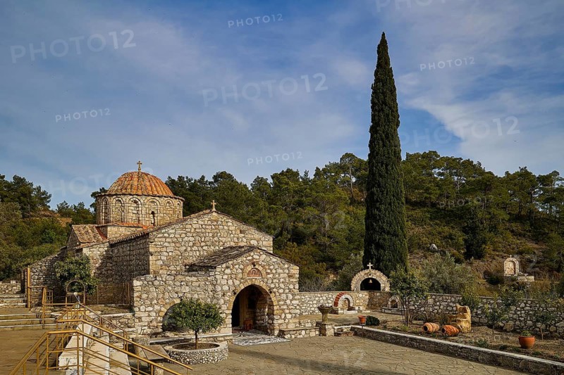 Stone church with cypress and wooded surroundings under a blue sky, monastery, Moni Thari, near Gadouras reservoir, lonely mountain region, Rhodes, Dodecanese, Greek Islands, Greece