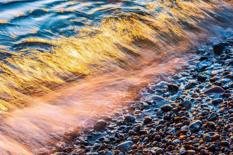 Wave play at sunrise on the chalk coast in Jasmund National Park, Rügen, Sassnitz, Mecklenburg-Western Pomerania, Germany