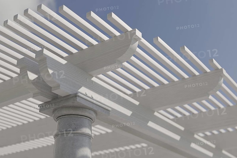 Detail abstract of A beautiful marble and wood pergola patio cover
