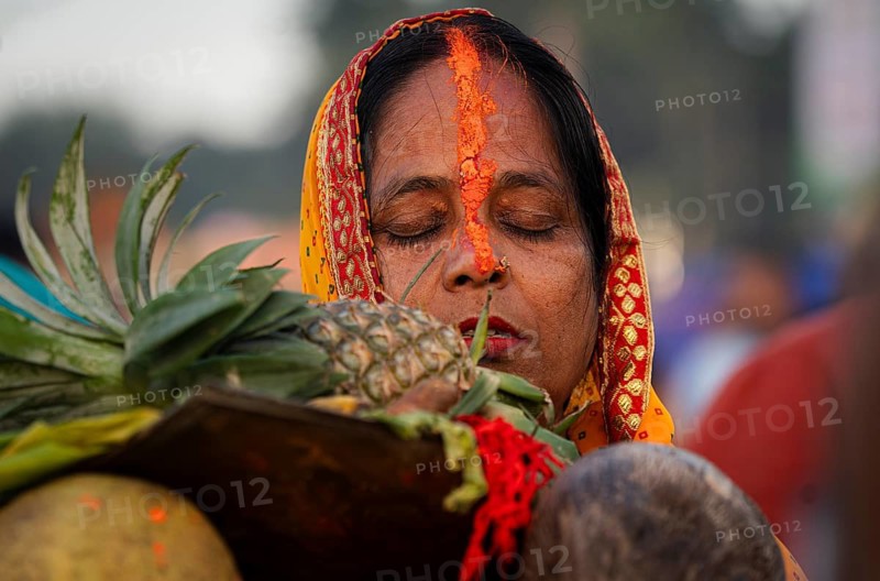 Hindu devotees perform rituals as they offer prayers to the Sun god in the bank of Brahmaputra river on the occasion of the 'Chhath Puja' festival in Guwahati, Assam, India on 7 November 2024. Chhath Puja is a significant Hindu festival celebrated primarily in the Indian states of Bihar, Jharkhand, Uttar Pradesh, and in Nepal. Dedicated to the worship of the Sun God (Surya) and his wife Usha (also referred to as Chhathi Maiya), this festival seeks blessings for prosperity, health, and longevity